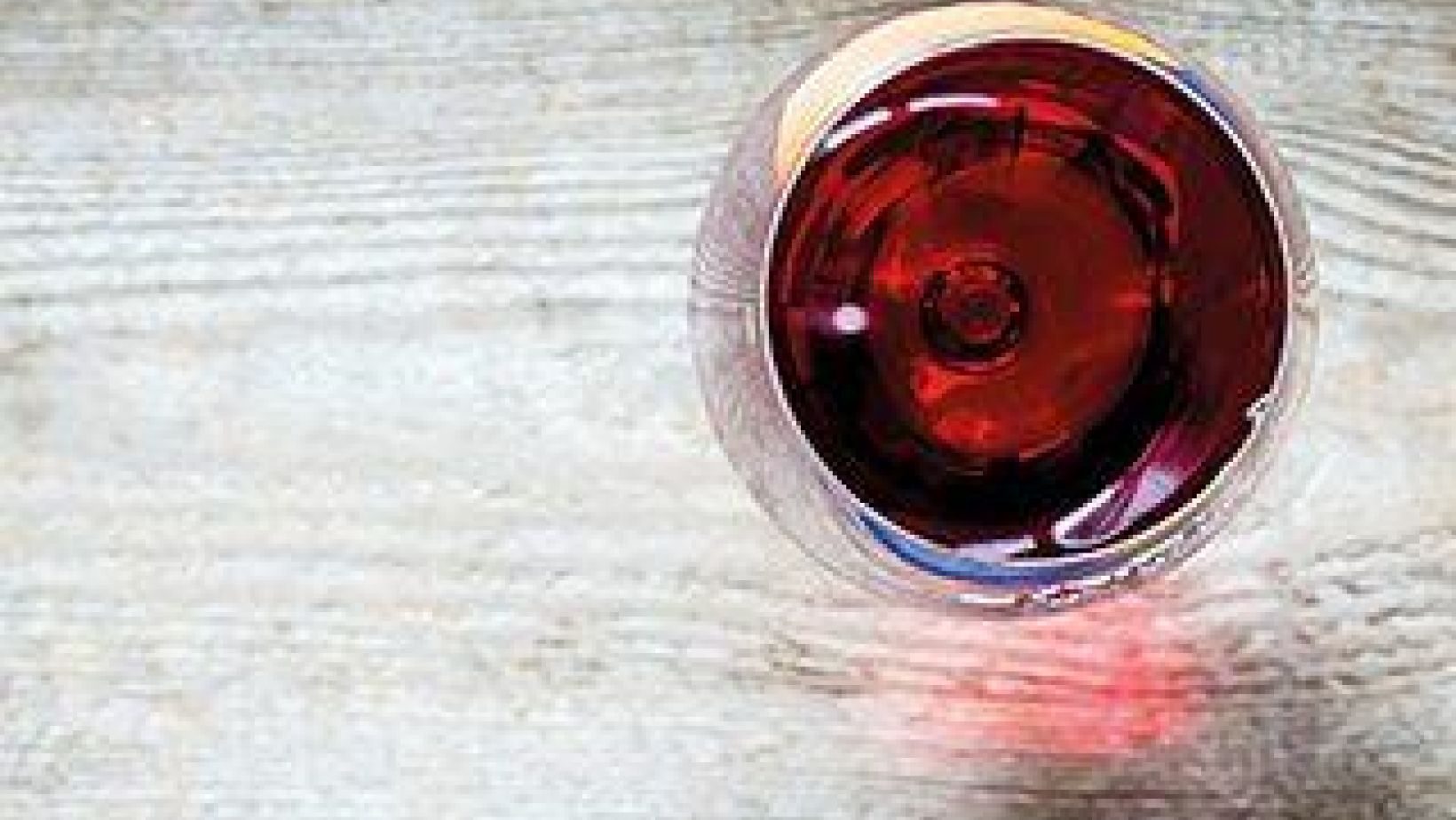 Red Wine In A Wineglass. The Top View