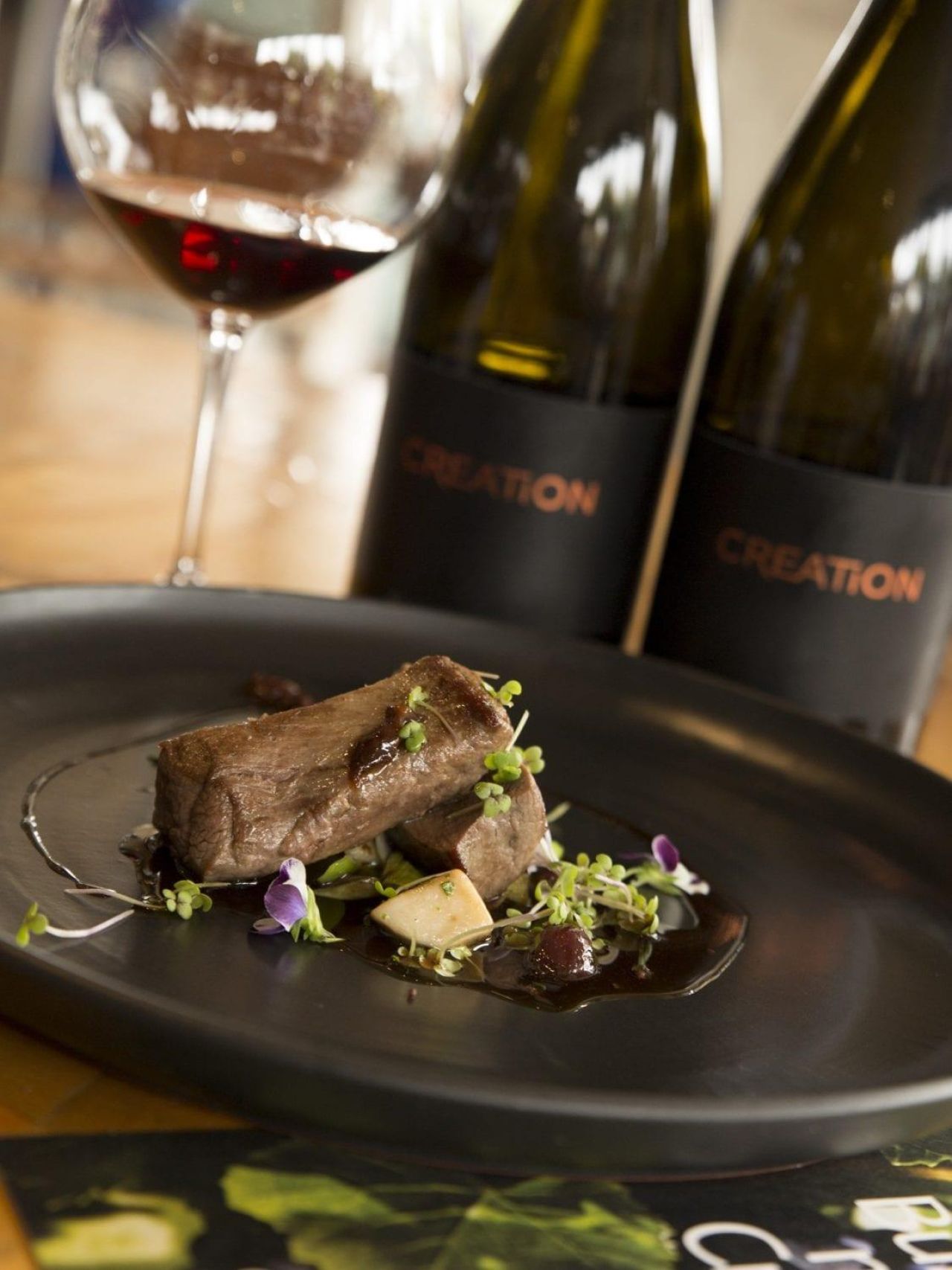 Creation Art of Pinot Noir is an excellent match with Springbok Loin with Braised Leek King Oyster Mushroom and Cherry Jus 1