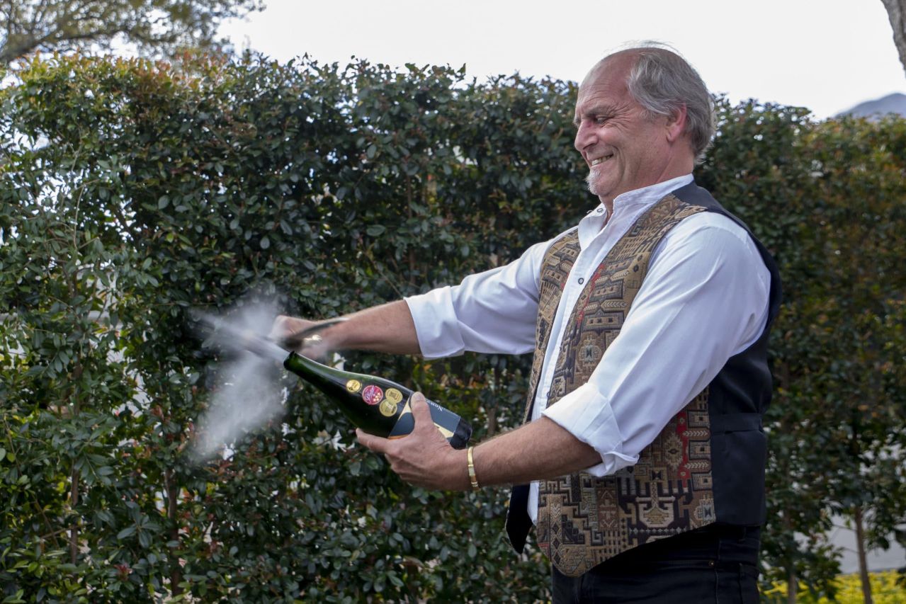Anton Smal from Newstead Wines performaing sabrage