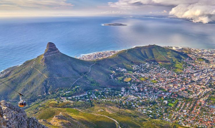Aerial view lions head mountain with ocean cloudy sky copy space beautiful landscape green mountains with vegetation surrounding urban city cape town south africa