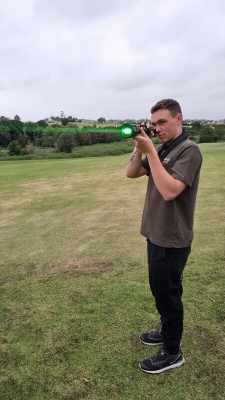 The hand-held bird laser in action at a gholf course.